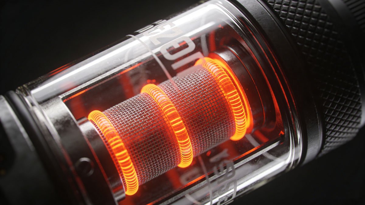Macro photography of a glowing vape mesh coil inside a sub-ohm tank